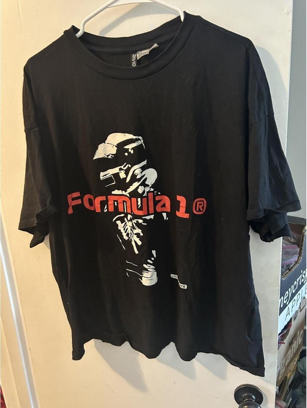 Black H&M Formula 1 racing tee with white skeleton graphic, size L  #motorsport
